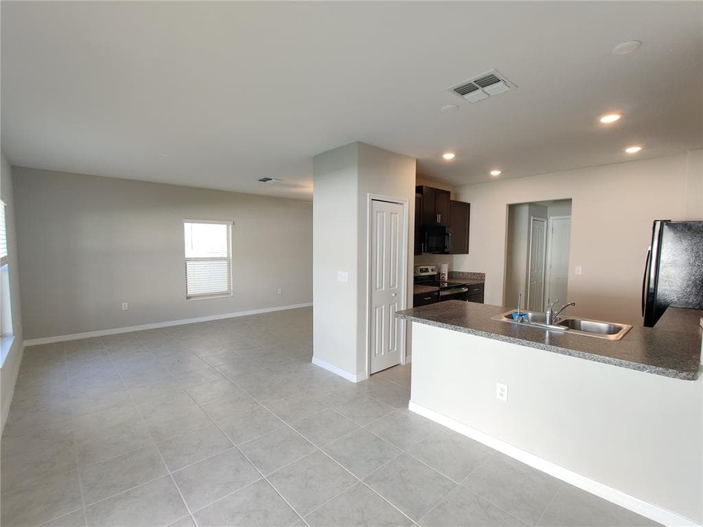 4710 NORMAN OAK PLACE, TAMPA, FL 33619 — zdjęcie 4