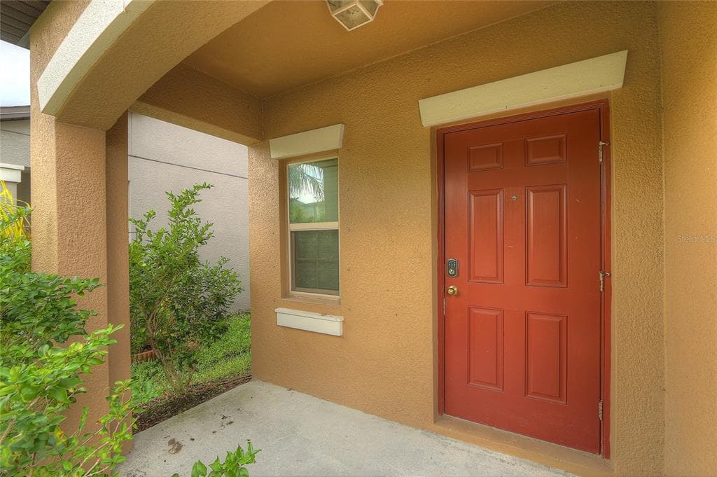 7217 RONNIE GARDENS COURT, TAMPA, FL 33619 — zdjęcie 4