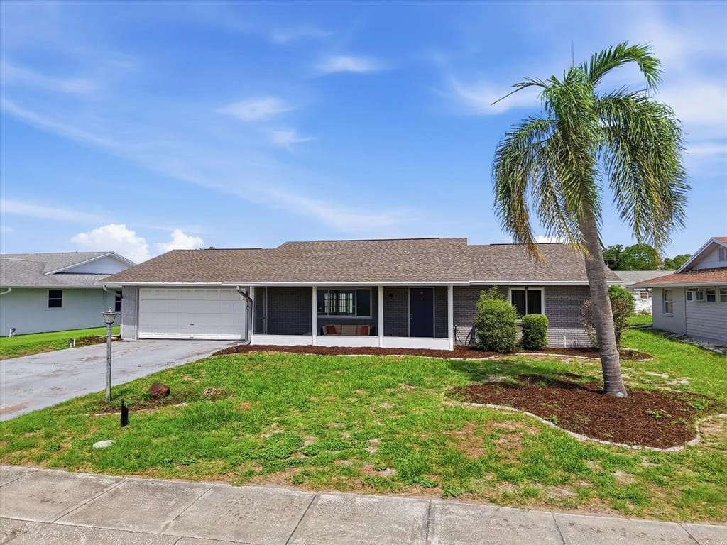 1404 SETON HALL DRIVE, SUN CITY CENTER, FL 33573