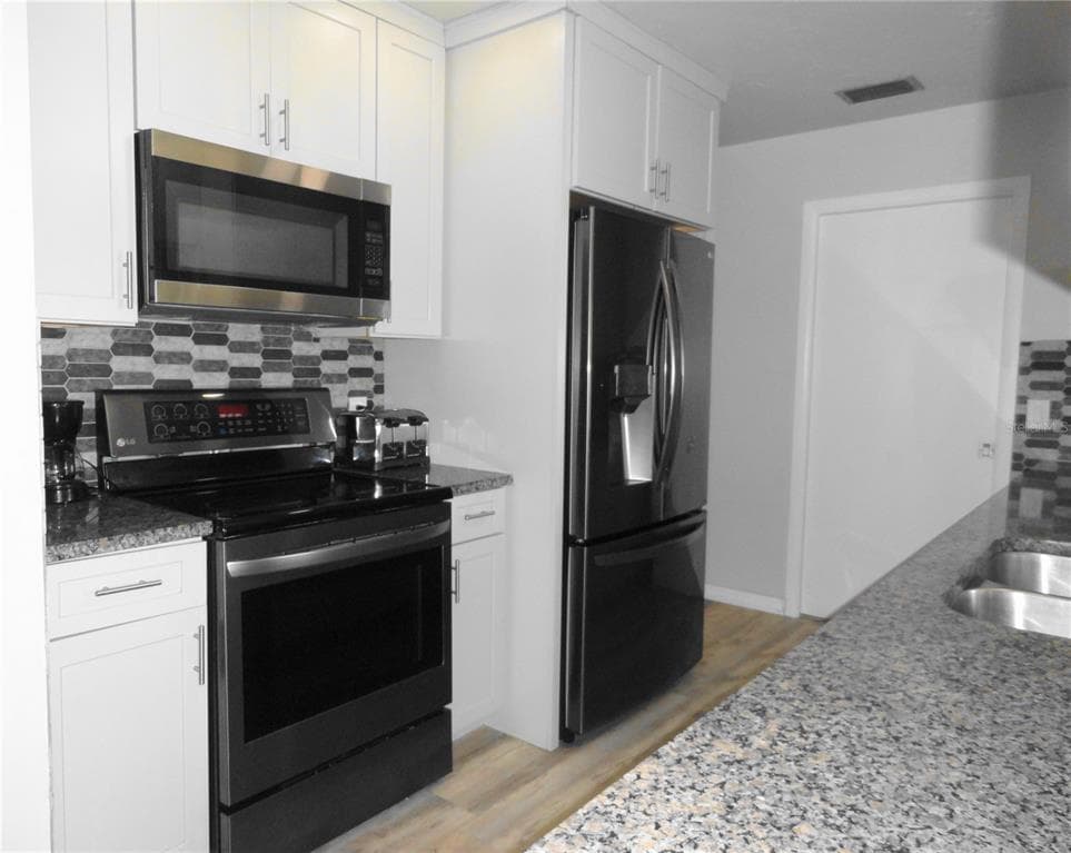 5226 NEVILLE TERRACE, PORT CHARLOTTE, FL 33981 — zdjęcie 4