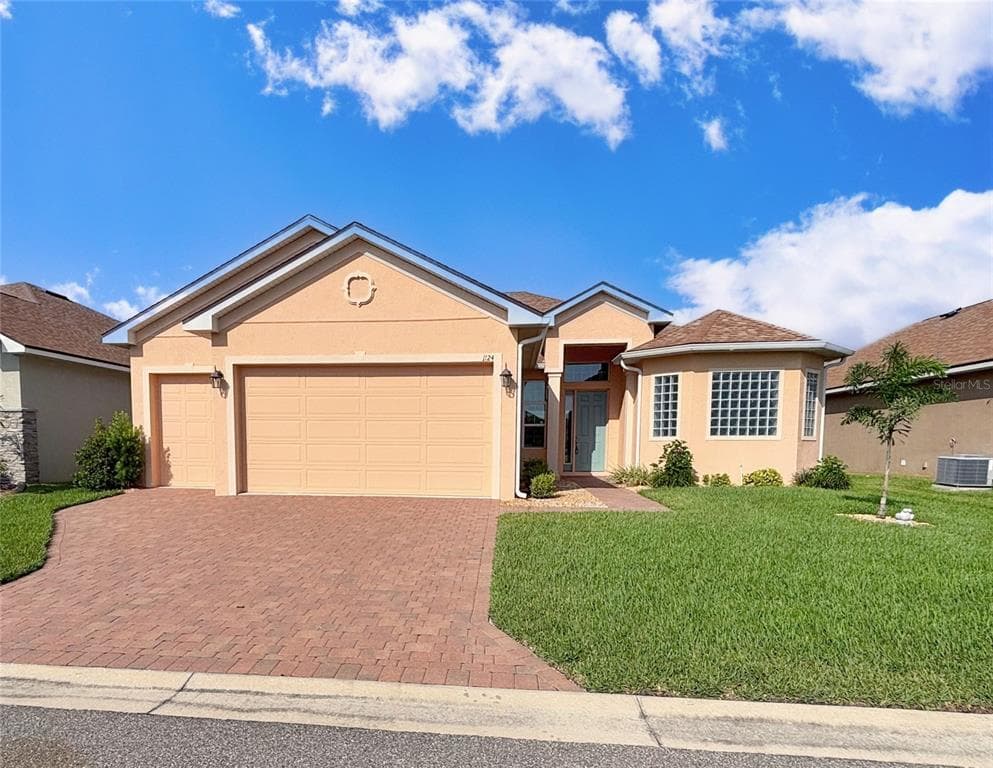 1124 SAWGRASS DRIVE, WINTER HAVEN, FL 33884