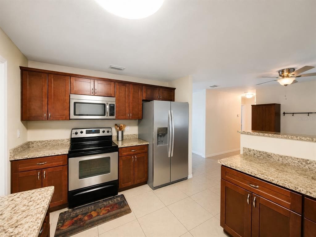 5814 HAMMON DRIVE, TAMPA, FL 33619 — zdjęcie 3