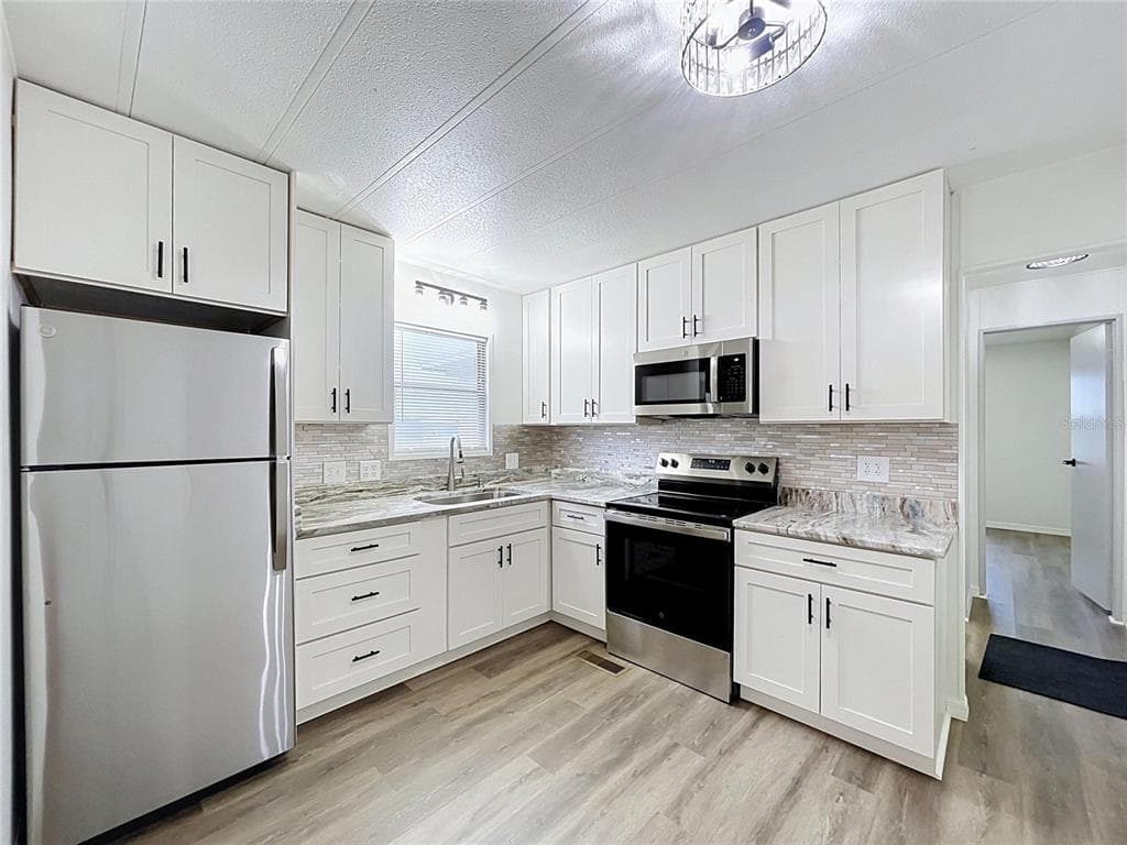 6965 FORT KING ROAD, ZEPHYRHILLS, FL 33541 — zdjęcie 4