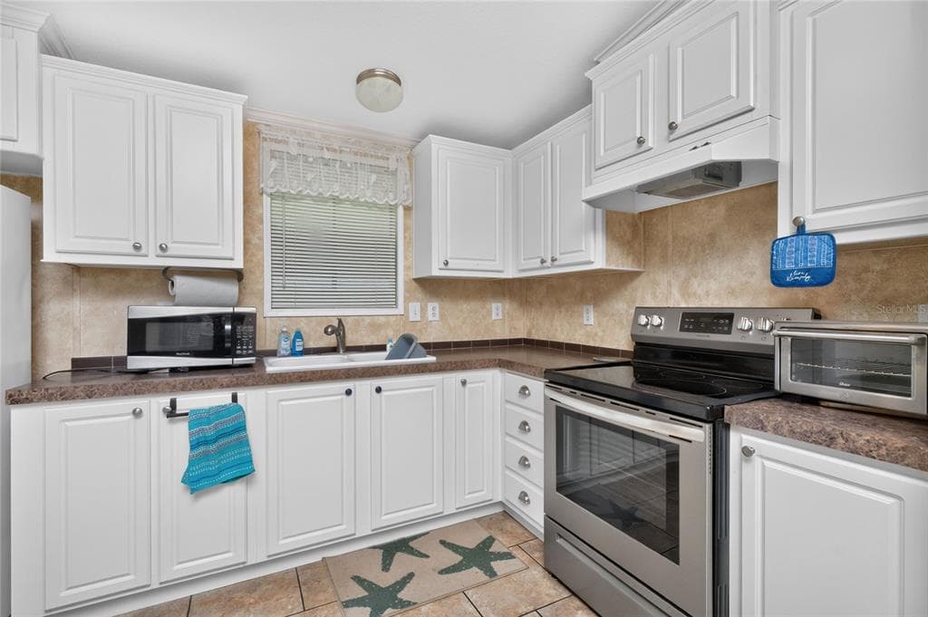 7464 DANVERS CIRCLE, PORT CHARLOTTE, FL 33981 — zdjęcie 3