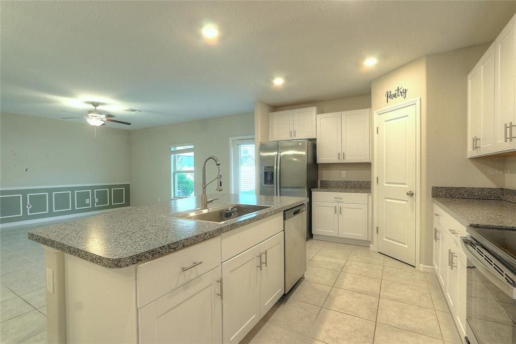 7217 RONNIE GARDENS COURT, TAMPA, FL 33619 — zdjęcie 3
