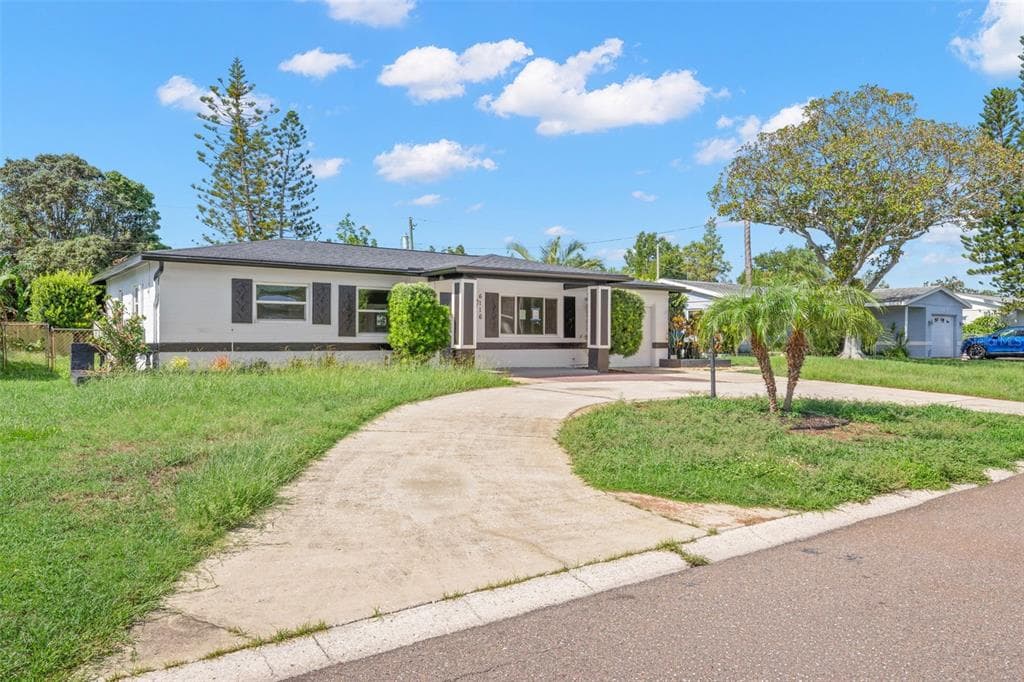 6116 52ND AVENUE N, KENNETH CITY, FL 33709