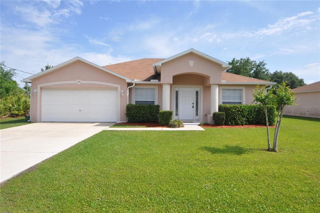 37 LOUISBURG LANE, PALM COAST, FL 32137