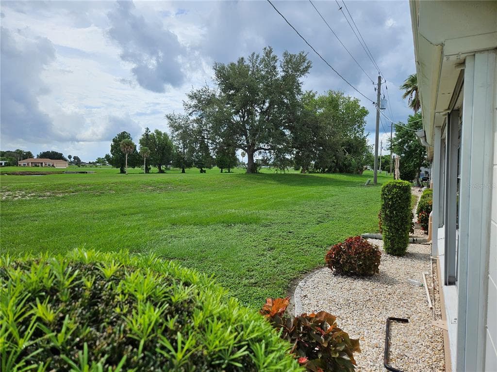 1505 N PEBBLE BEACH BOULEVARD, SUN CITY CENTER, FL 33573 — zdjęcie 4