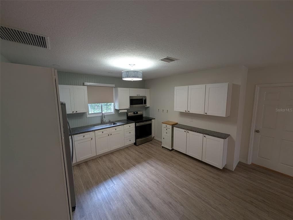 321 W PENNSYLVANIA AVENUE, DELAND, FL 32720 — zdjęcie 5
