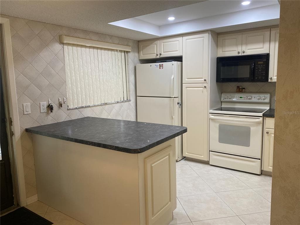 2440 WINDING CREEK BOULEVARD # 108, CLEARWATER, FL 33761 — zdjęcie 3