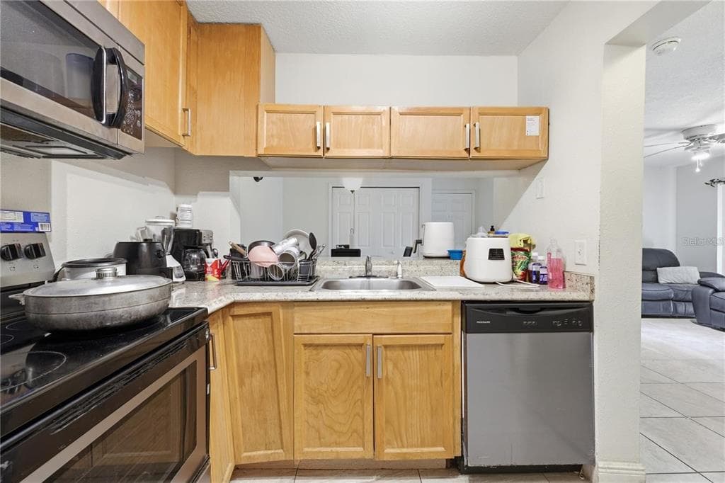 5219 VIA HACIENDA CIRCLE # B111, ORLANDO, FL 32839 — zdjęcie 3