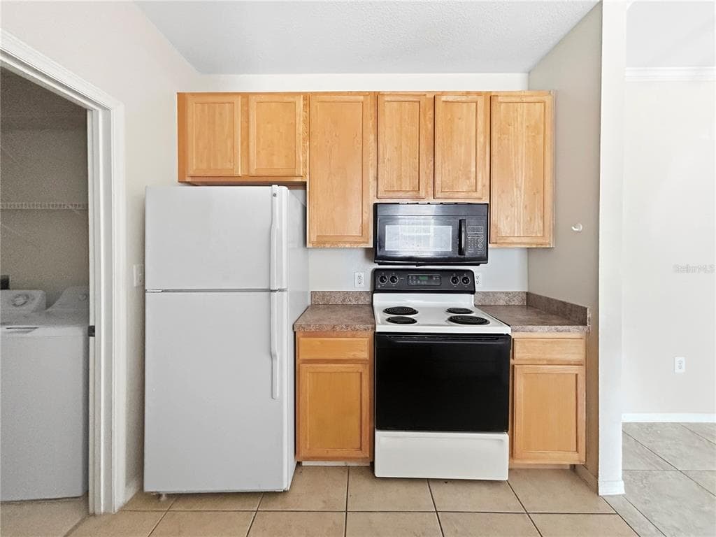 10205 COURTNEY PALMS BOULEVARD # 101, TAMPA, FL 33619 — zdjęcie 4