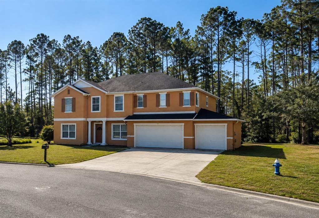 70 ROLLINS LANE, PALM COAST, FL 32164