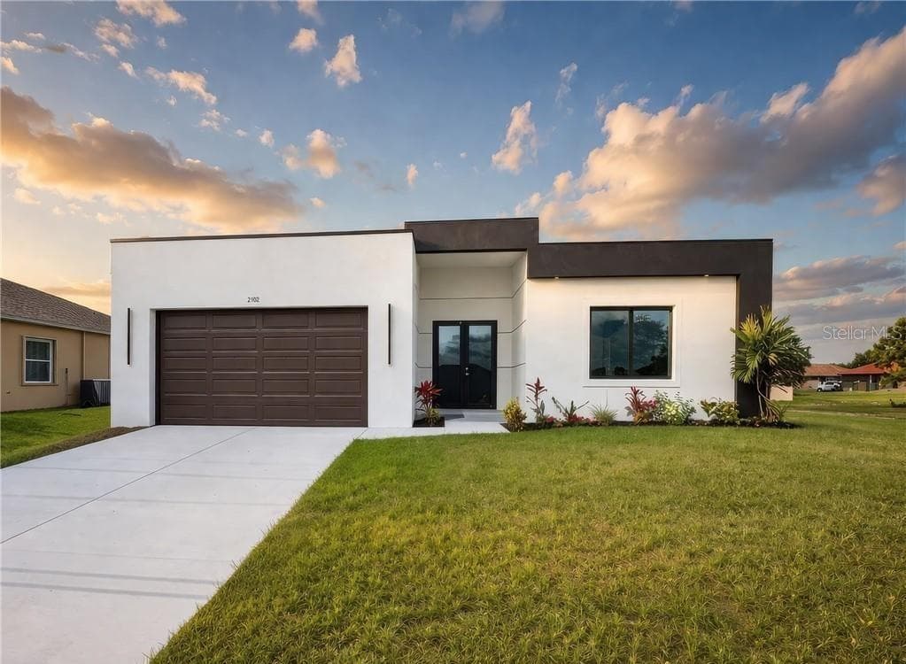 2102 NW 25TH PLACE, CAPE CORAL, FL 33993