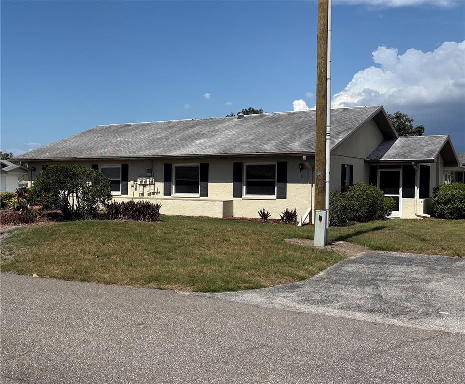 1905 CANTERBURY LANE # E-9, SUN CITY CENTER, FL 33573