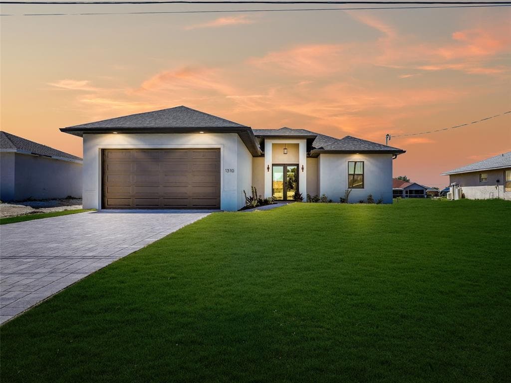 1310 NW 11TH TERRACE, CAPE CORAL, FL 33993