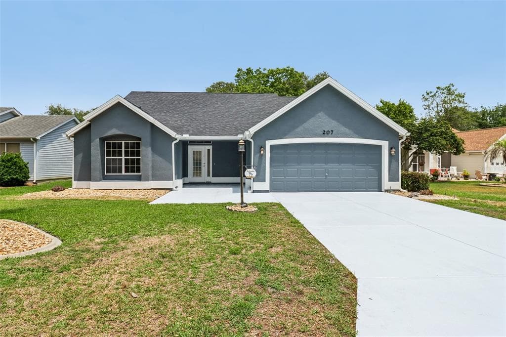 207 DESOTA COURT, LADY LAKE, FL 32159