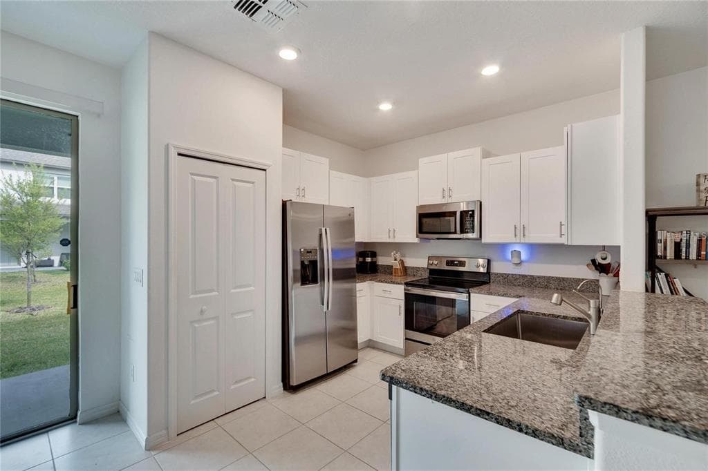 14444 EDITORS NOTE STREET, SUN CITY CENTER, FL 33573