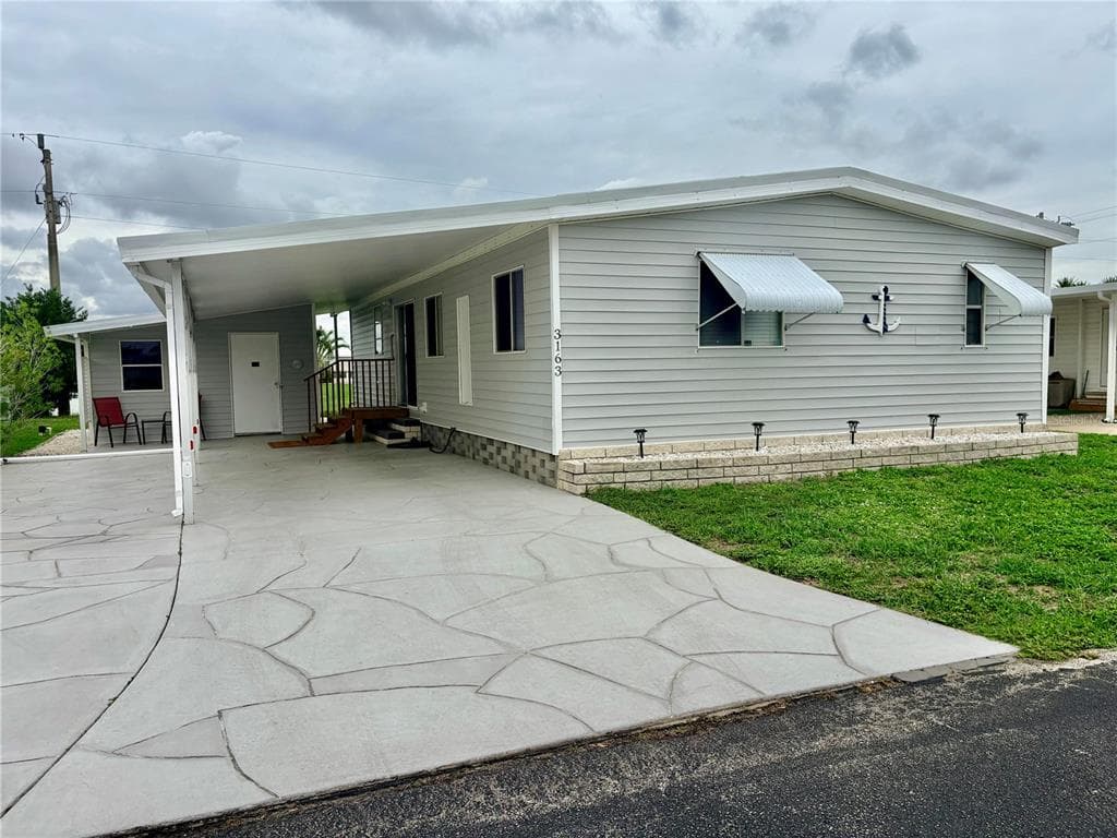 3163 INDIAN VILLAGE LANE, NORTH FORT MYERS, FL 33917