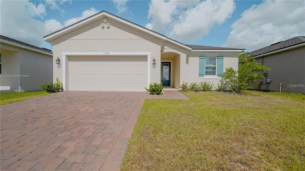1194 BOARDWALK PLACE, KISSIMMEE, FL 34747