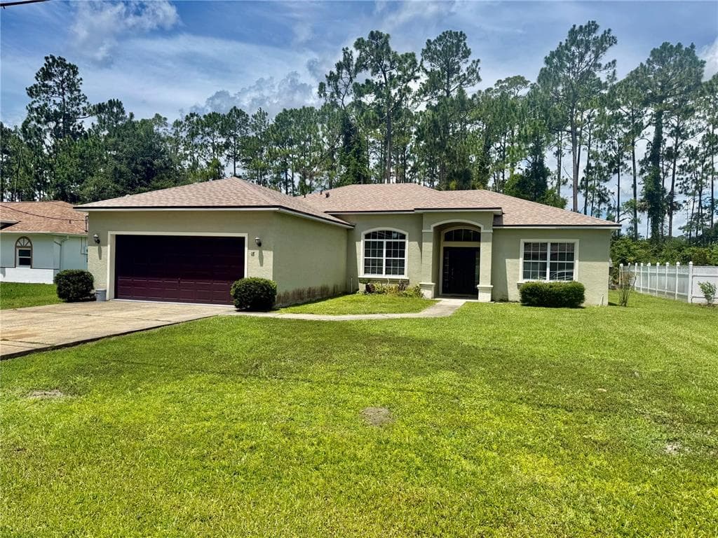 18 POINBURY DRIVE, PALM COAST, FL 32164