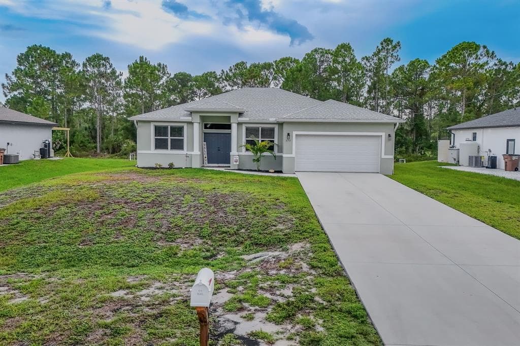 670 NIMITZ BOULEVARD, LEHIGH ACRES, FL 33974