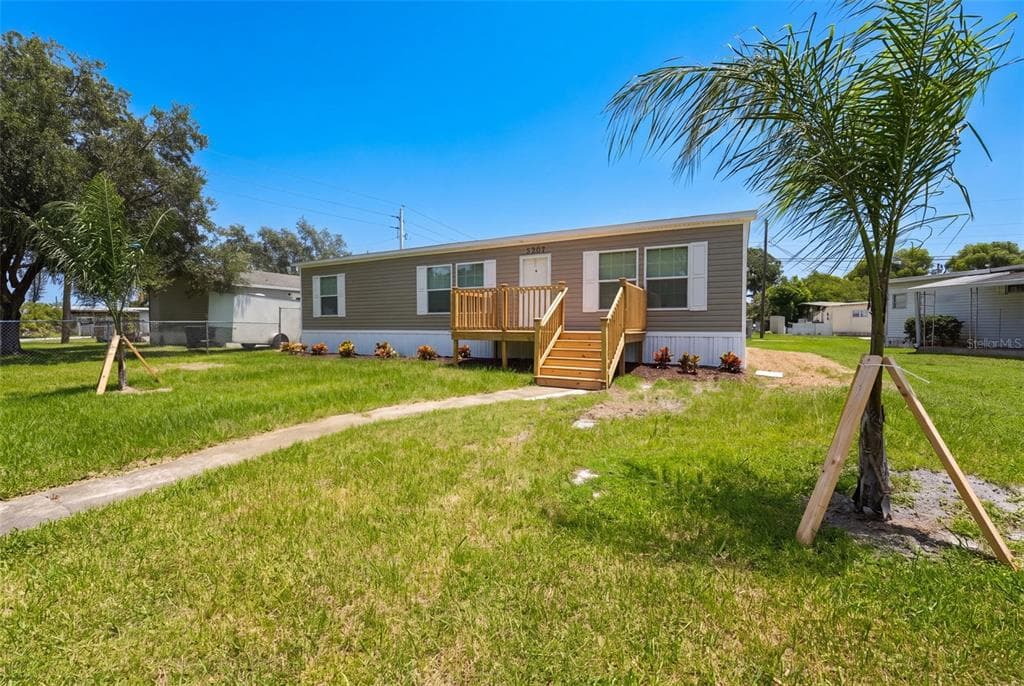 5207 ORANGE AVENUE, PORT ORANGE, FL 32127