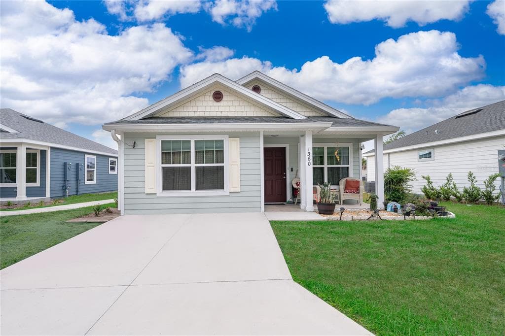 1360 COTTAGE CIRCLE, TAVARES, FL 32778