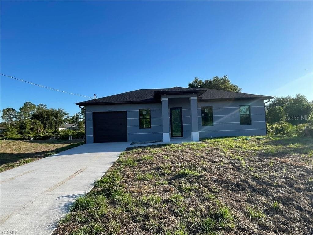707 LEDGE STREET, LEHIGH ACRES, FL 33972