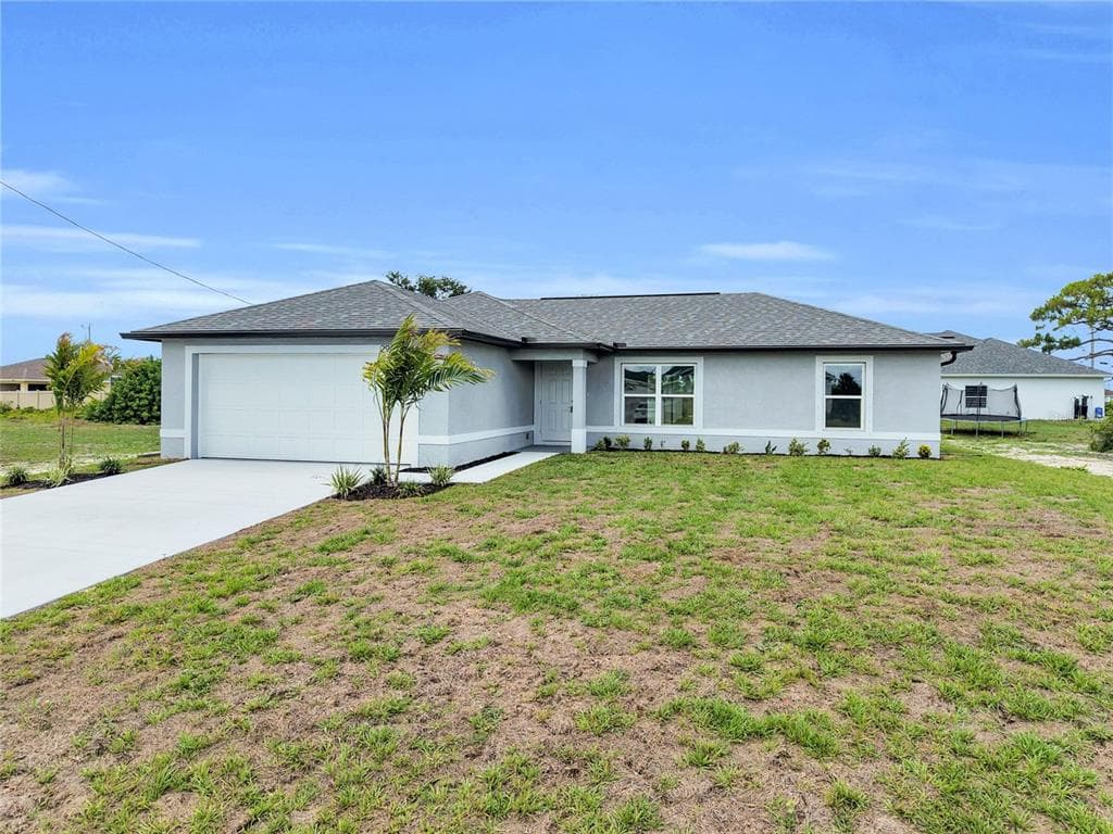 310 NE 9TH TERRACE, CAPE CORAL, FL 33909