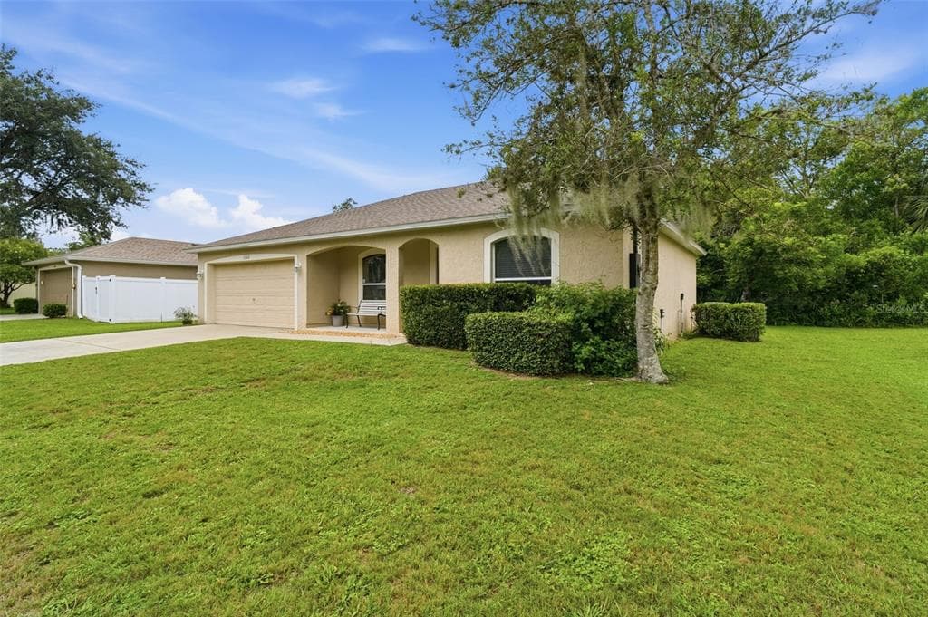 1302 BENTON LAKE DRIVE E, DELAND, FL 32724