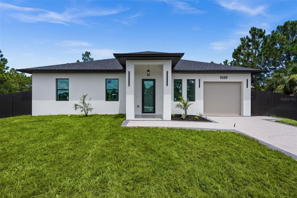 1039 BASSINGER AVENUE S, LEHIGH ACRES, FL 33974